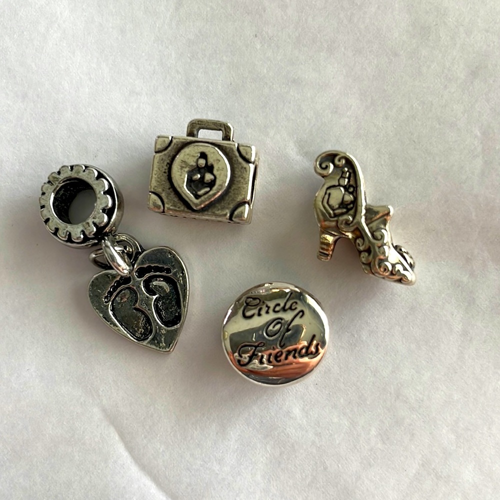 Bracelet Charms two of these have the 925 sterling silver markings, see photos.